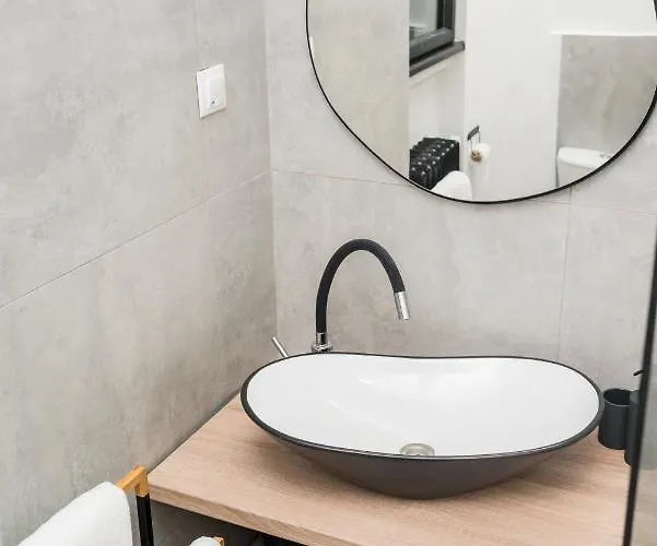 Explore The From Its Center In A Chic Balcony Apartament